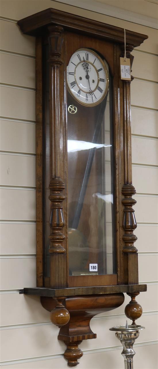 A 19th century Vienna wall clock, 3ft 4ins